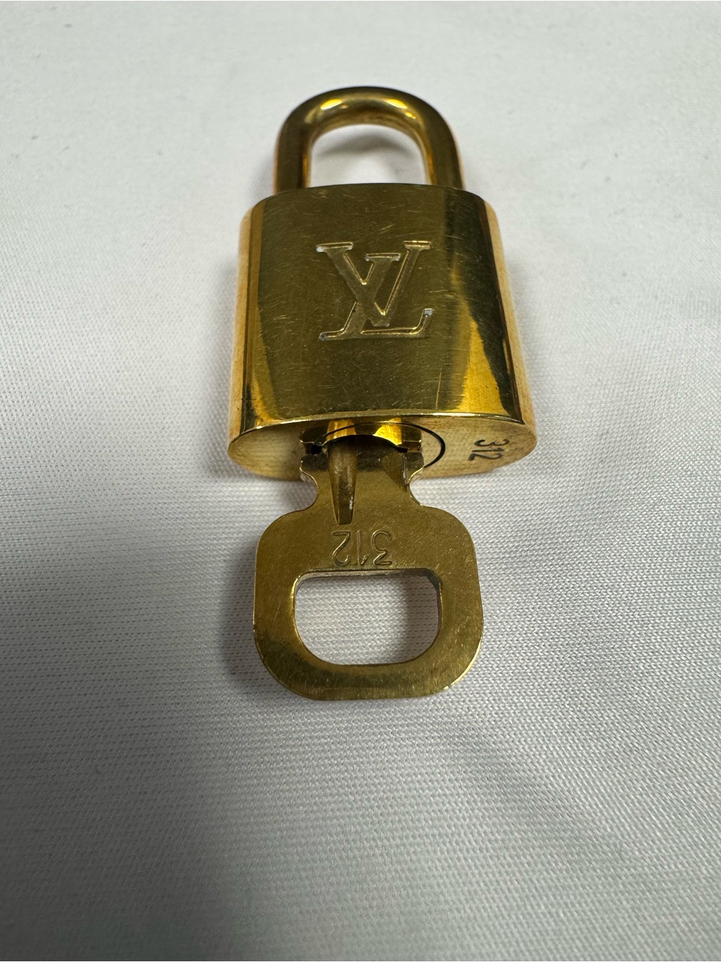 Louis Vuitton Gold Padlock